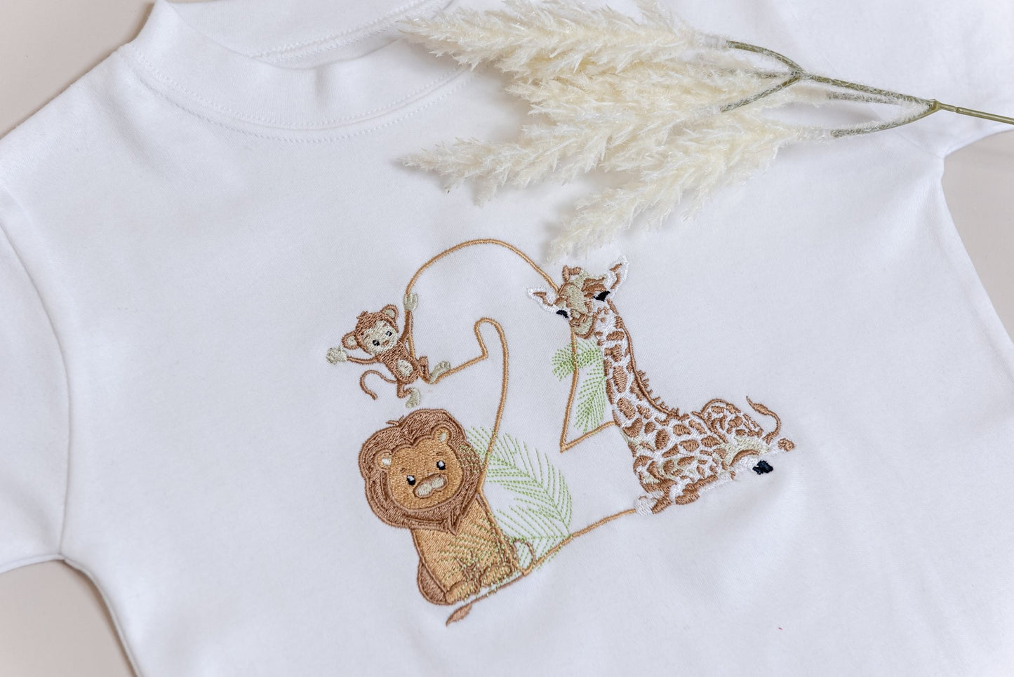 Giraffe-themed toddler t-shirt, customisable with child's name and age