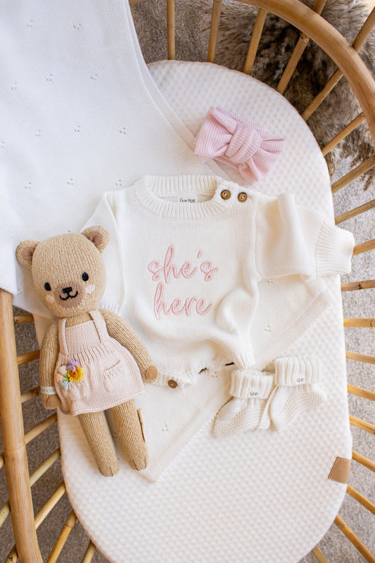 'She's Here' Baby Romper | White