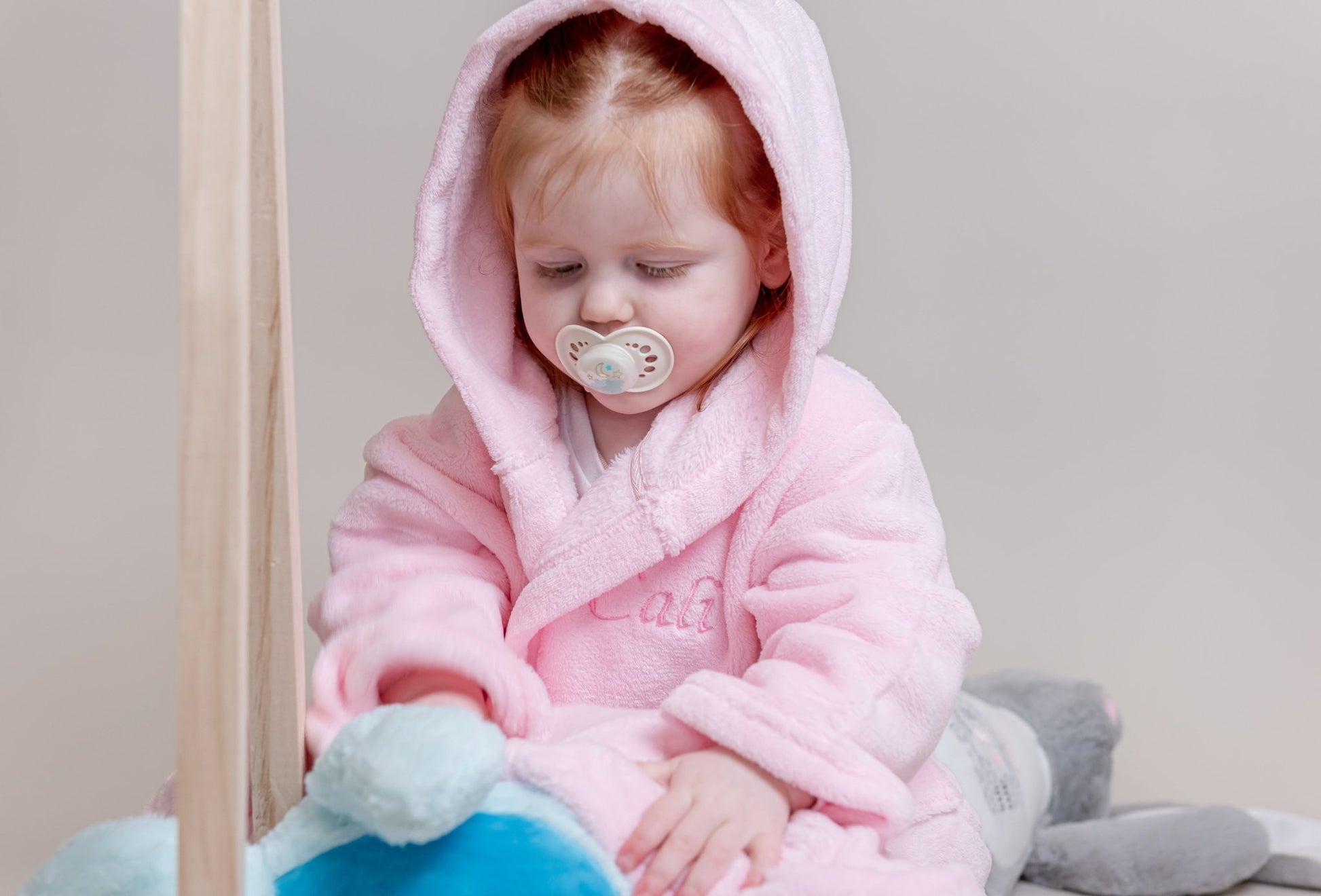 Make bath time special with our personalised pink bath robe for babies