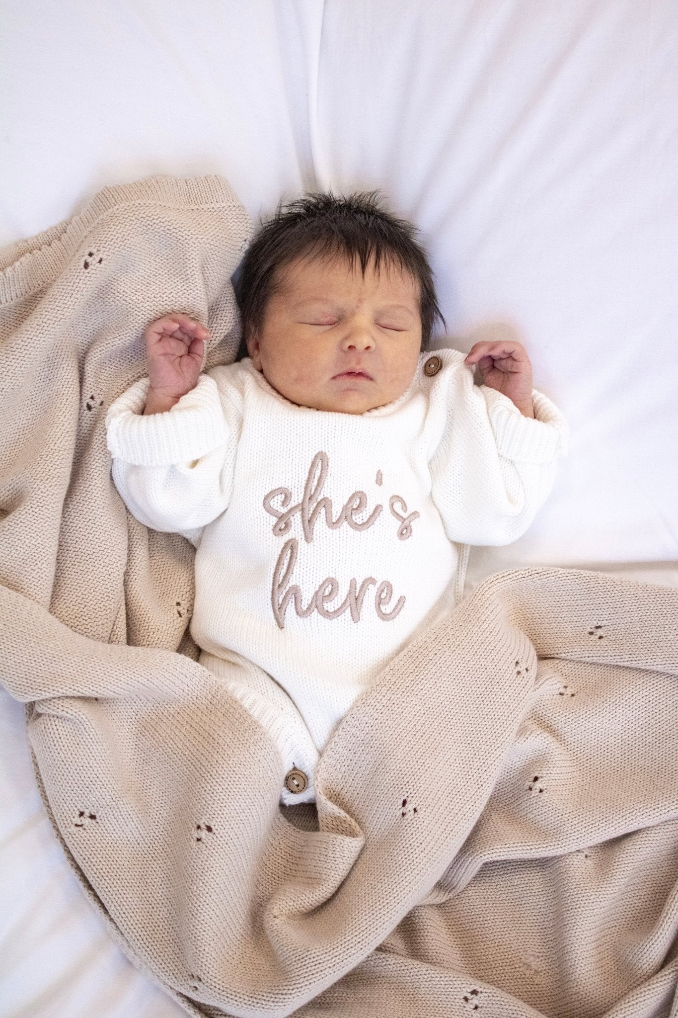 'She's / He's Here' Baby Romper | White