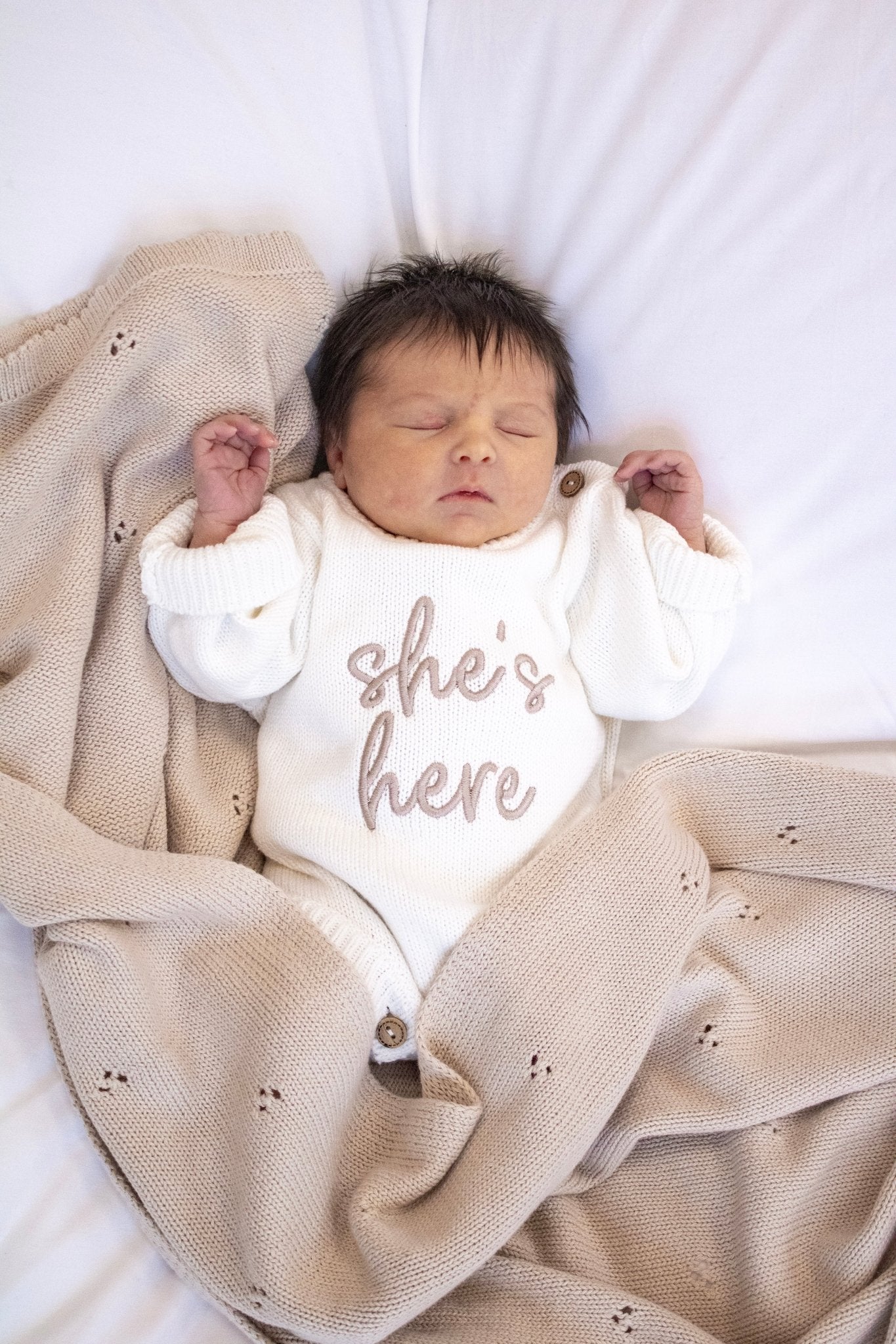 'She's Here' Baby Romper White