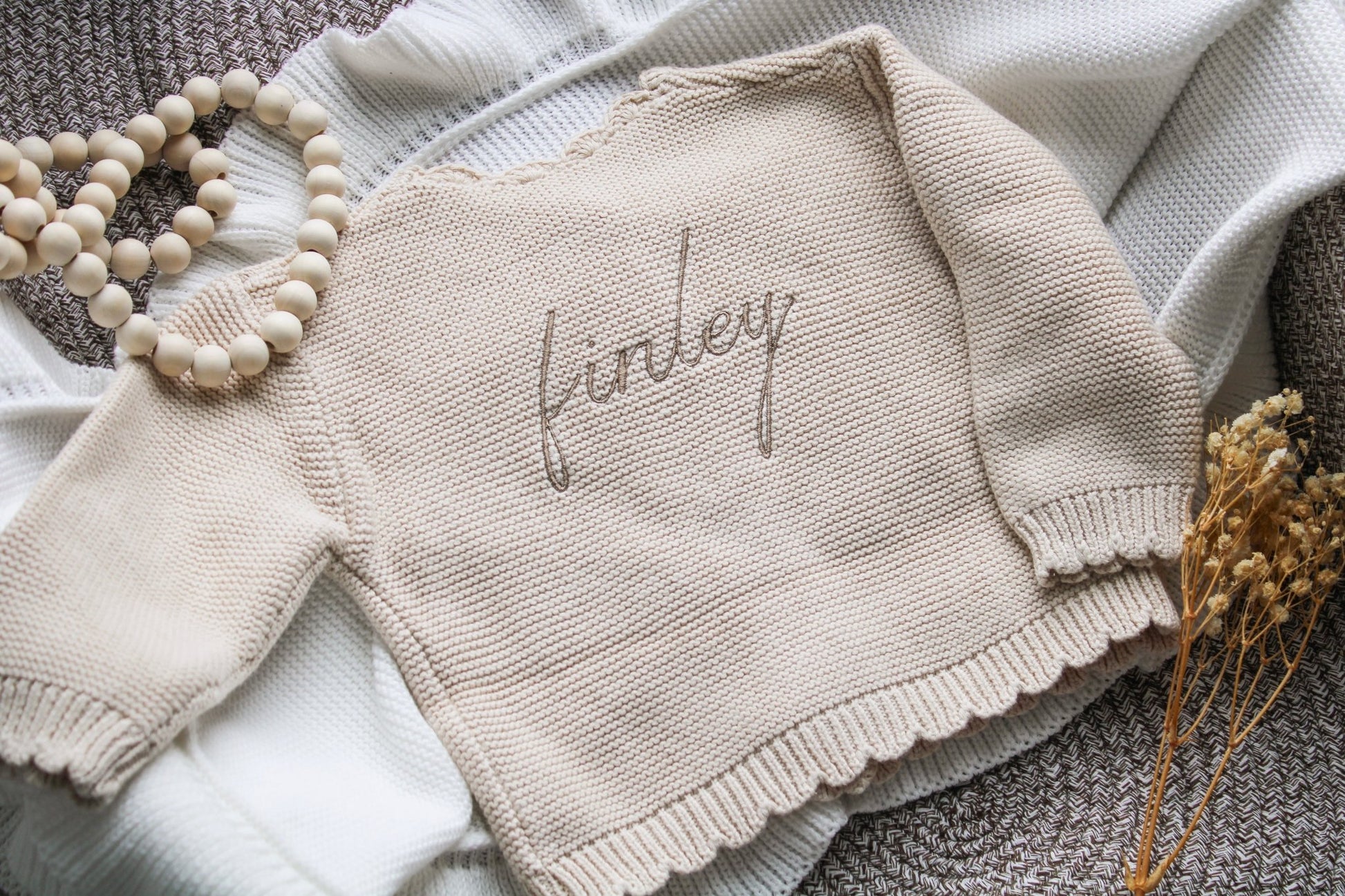 Button-Up Beige Knit Baby Cardigan: Versatile and Stylish