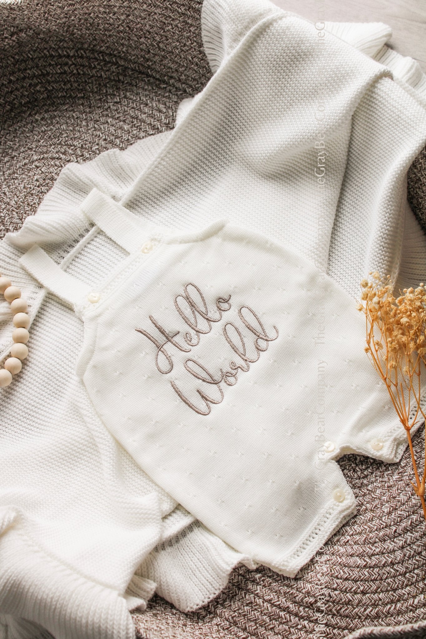 Hello world baby romper - this short sleeve, vest style knit romper is the perfect outfit for a baby shower gift 